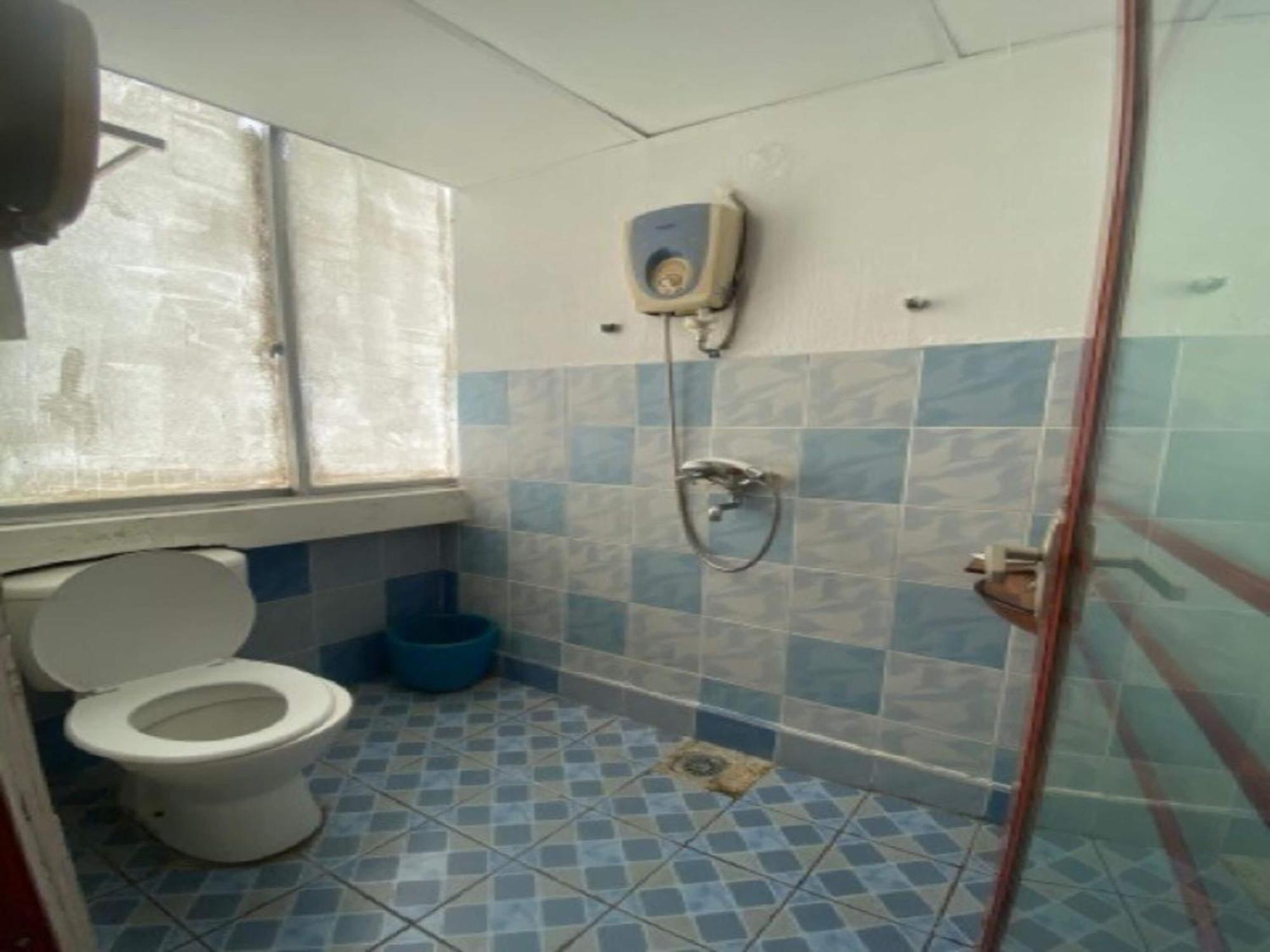 Oyo 90979 Sianglory Inn كوتا كينابالو المظهر الخارجي الصورة