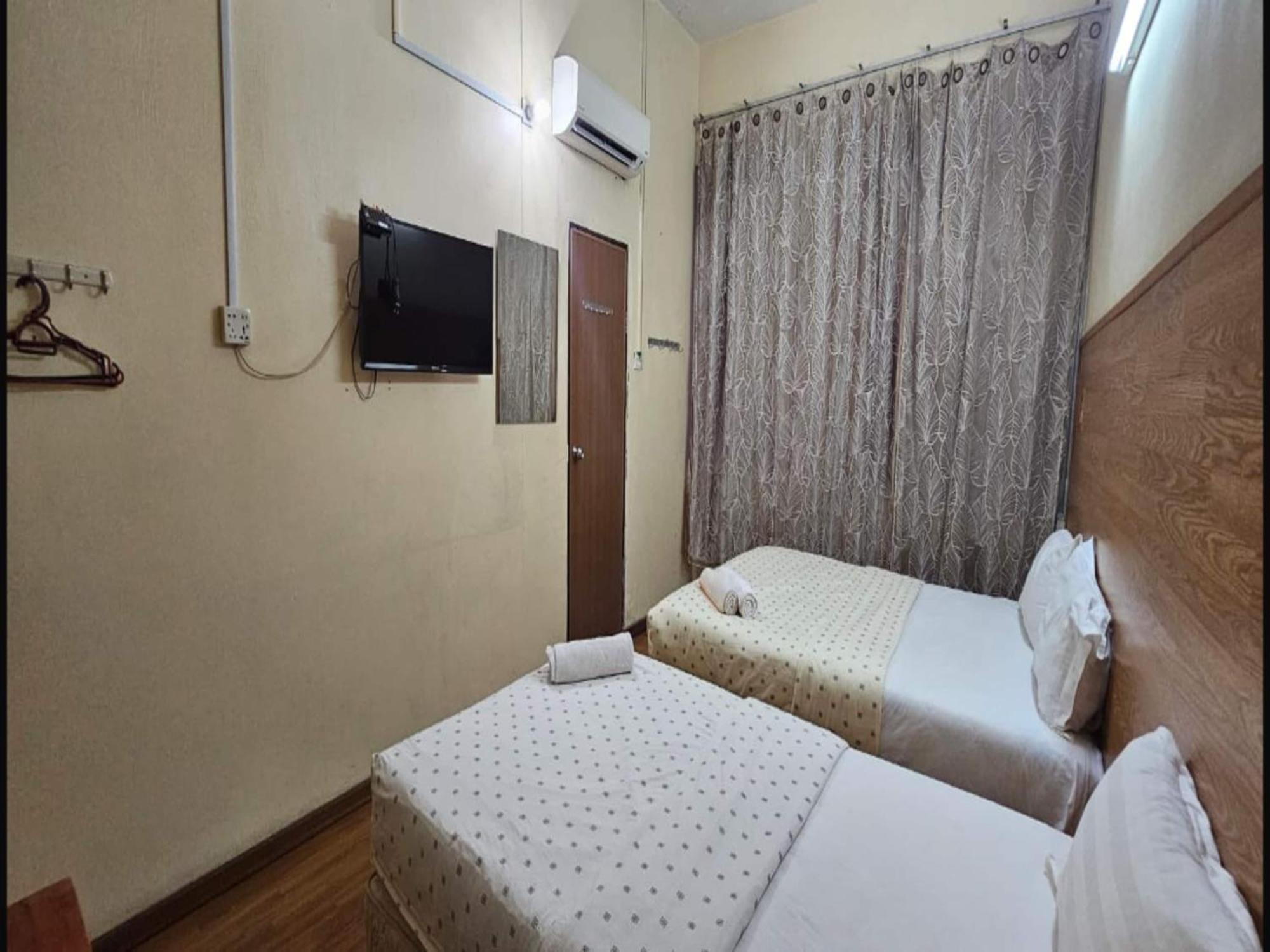 Oyo 90979 Sianglory Inn كوتا كينابالو المظهر الخارجي الصورة